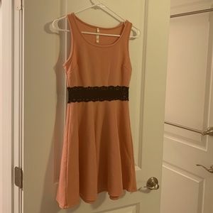 Sleeveless short Coral Dress with Black 2 1/2” Lace band around midriff